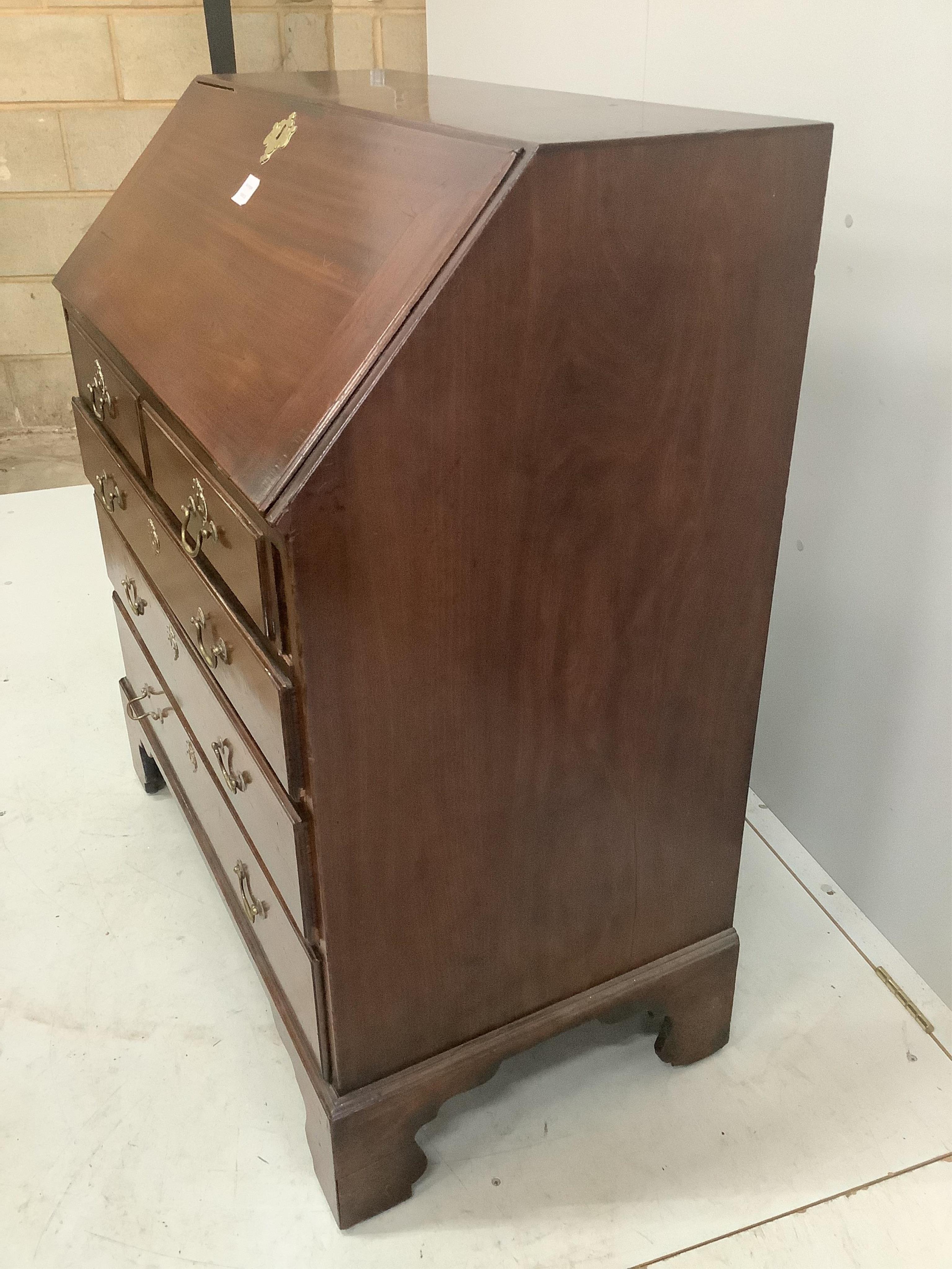 A George III mahogany bureau, width 91cm, depth 52cm, height 105cm. Condition - poor